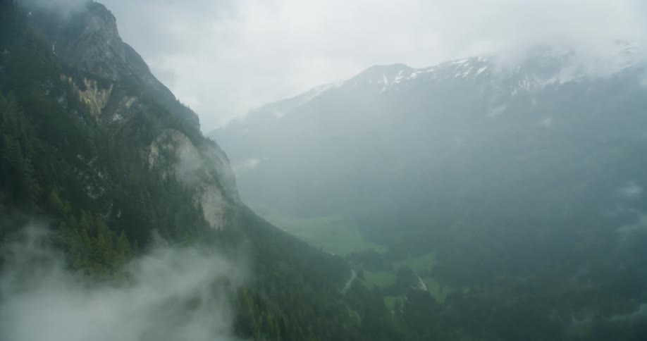 The valley is covered with fog