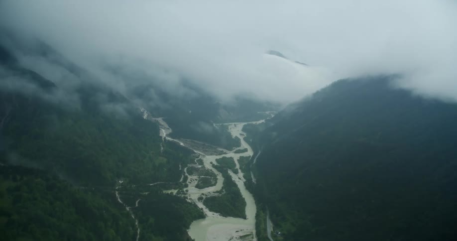 A stream runs by the mountain