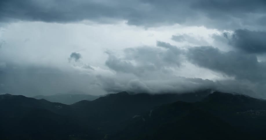 Aerial panorama of mountain ranges on a cloudy day