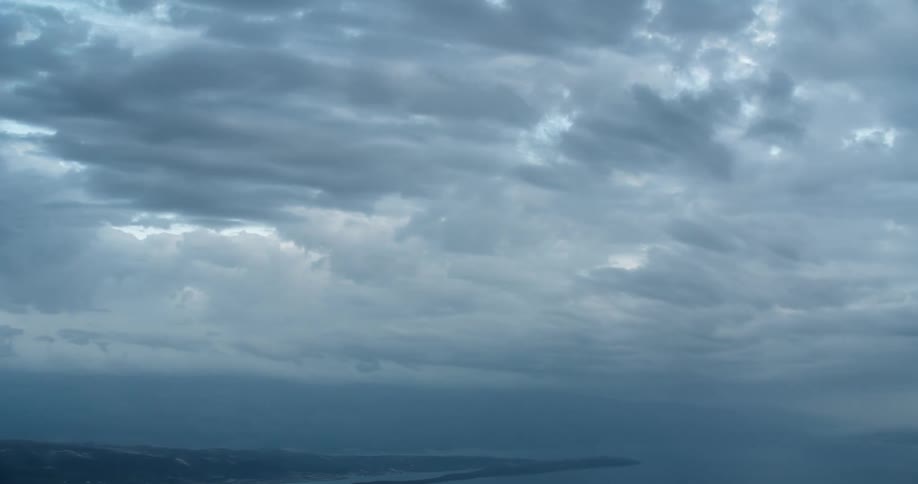 Heavy clouds fill the sky over the peninsula