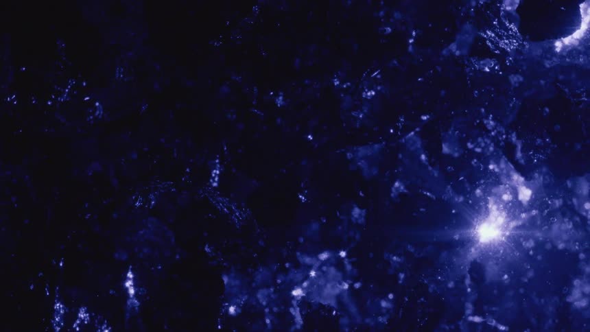 The light reflects on the metallic material in the graphic
