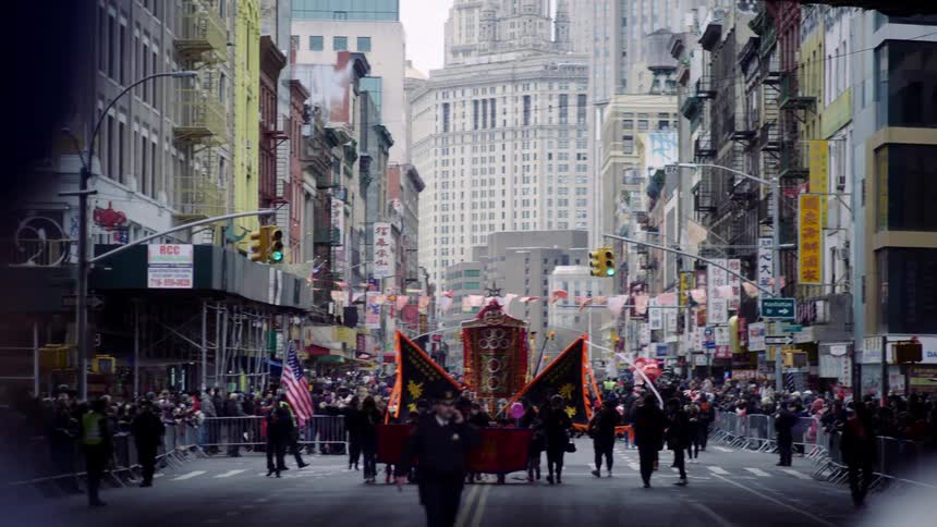 Crowd of people watching a chinese festival