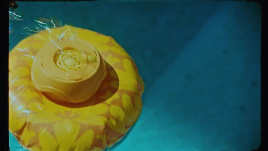 Float releasing soap bubbles while in the pool