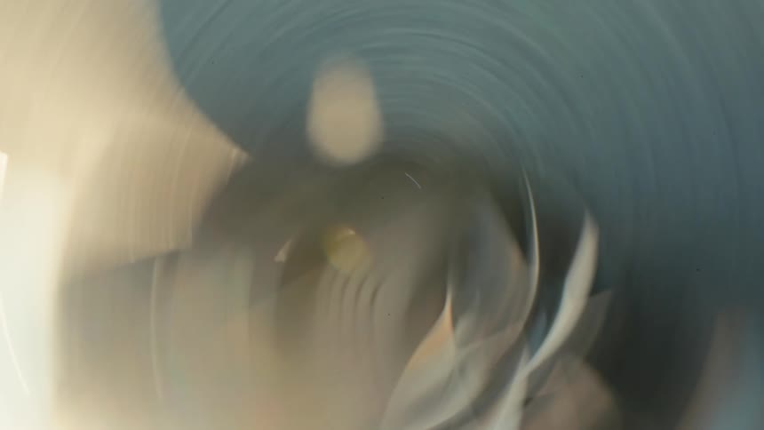 Abstract wheel of a vehicle moving from orbit