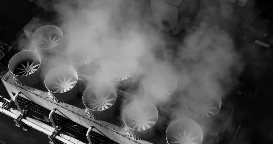 Exterior of a factory chimney emitting pollutants