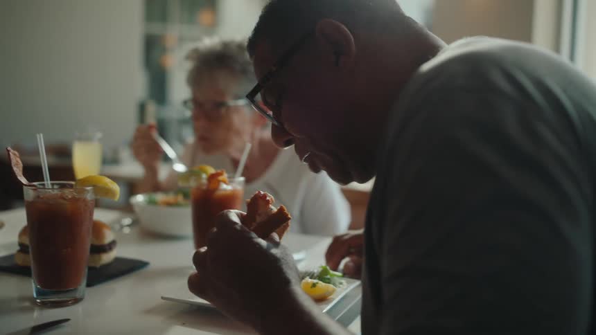 People sitting at a table having lunch