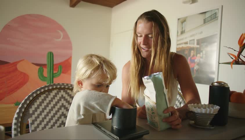 Mother and a little son cooking