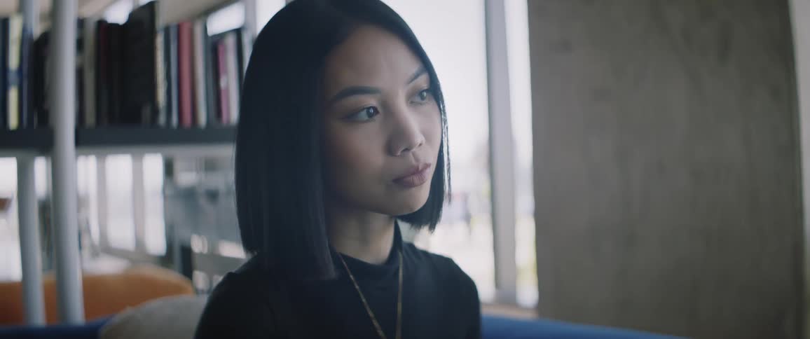 Portrait of a young woman in a working environment