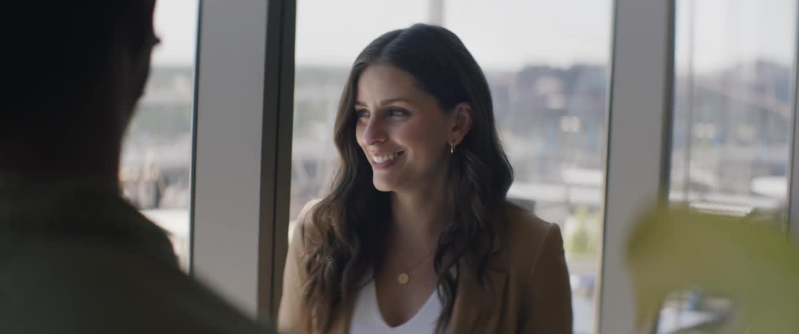 Woman indoors talking smiling