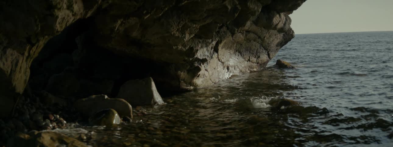 Water flows into a coastal cave