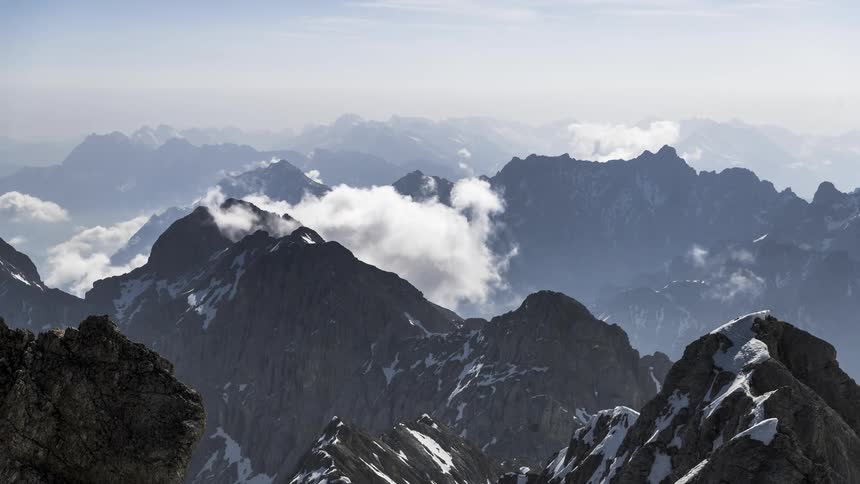Mountain range with rocky and snowy peaks