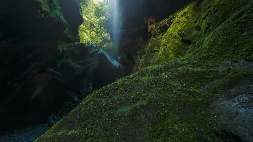 Water falls down into the cavern