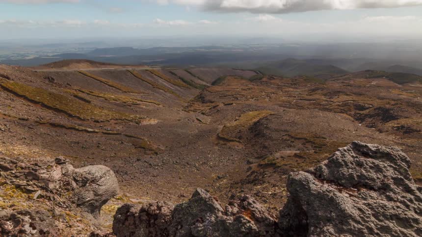 Rocky and mountainous terrain on a cloudy day