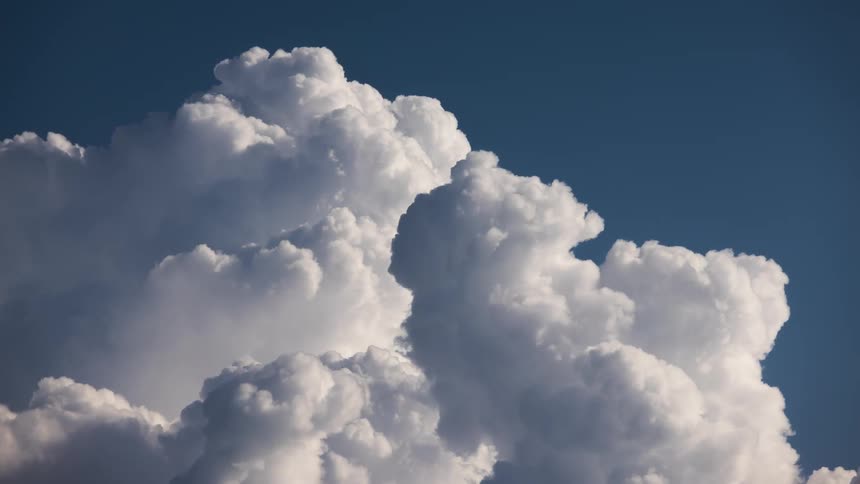 The sky fills with big white clouds
