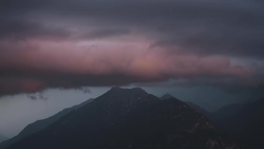 Mountain ranges on a day with hazy clouds