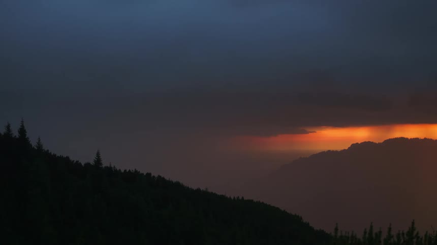 Thunderstorms dump rain on mountains and a plain
