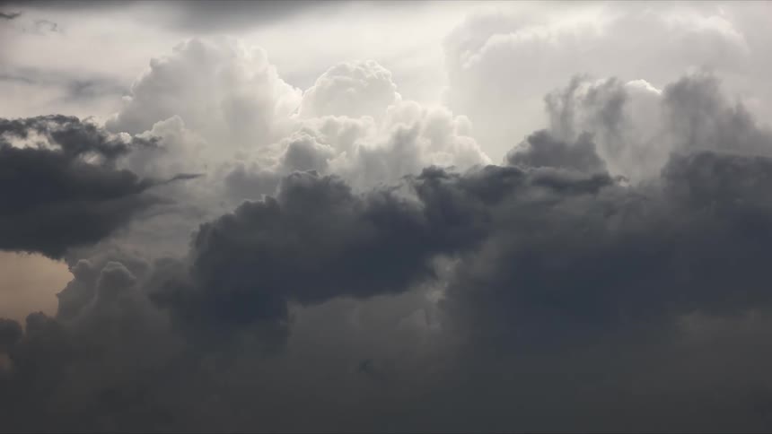 Dark storm clouds billowing in the sky