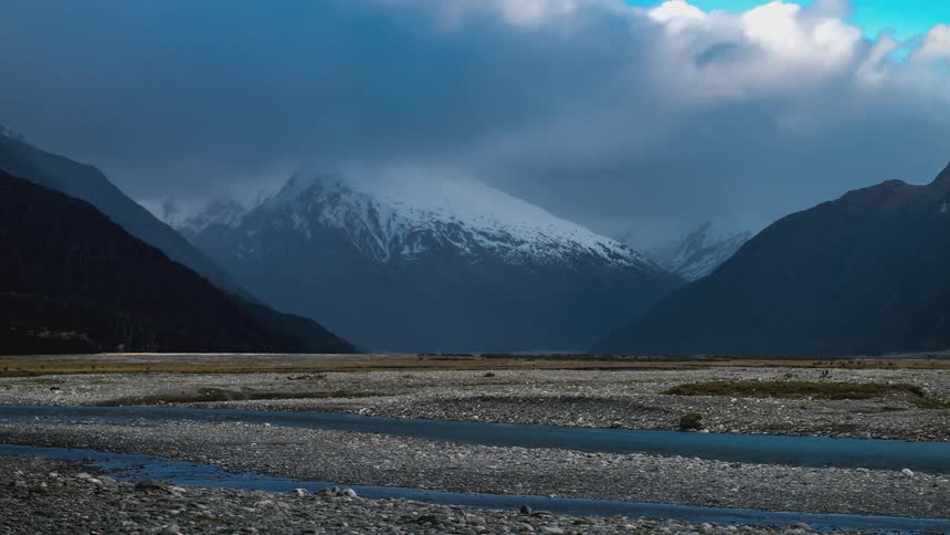Heavy clouds move over the mountain range