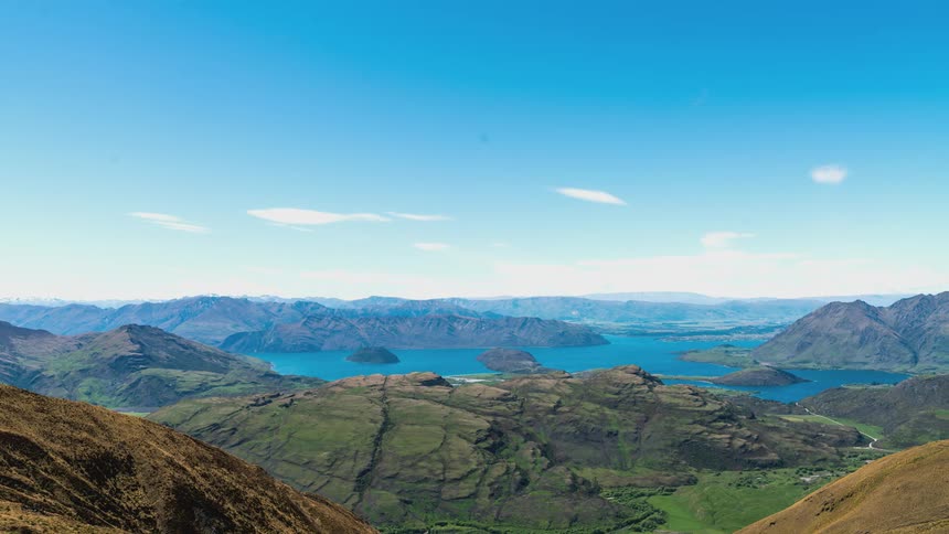 Mountain range with a blue lake on a clear day