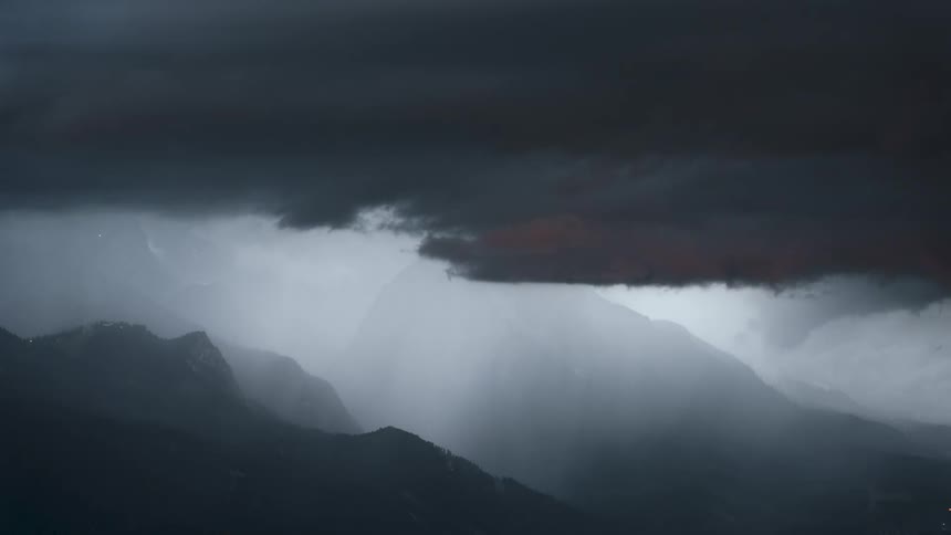 Mountains with misty clouds passing by