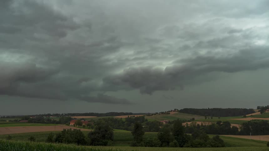 Storm clouds flow over the landscape