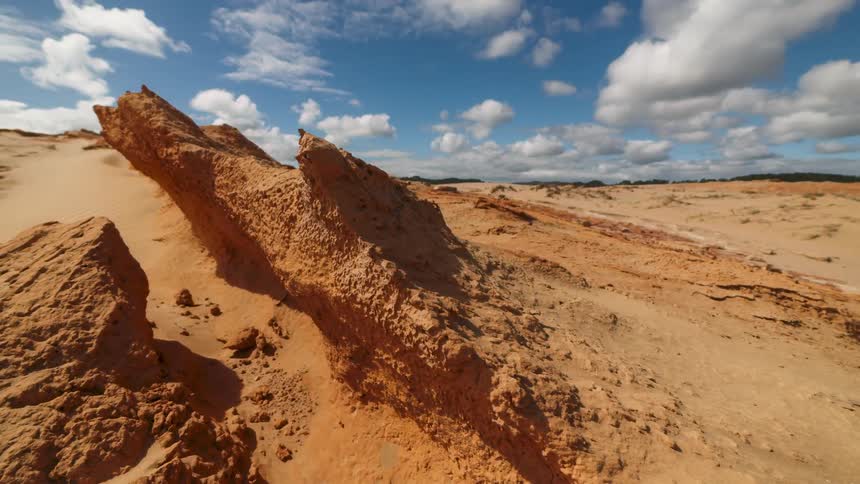 A large crevice is in the desert