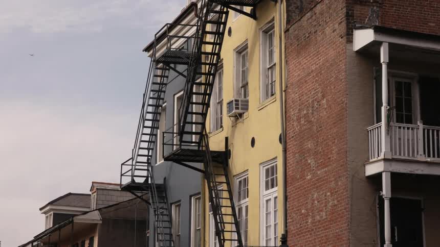 The outside of apartment buildings are shown