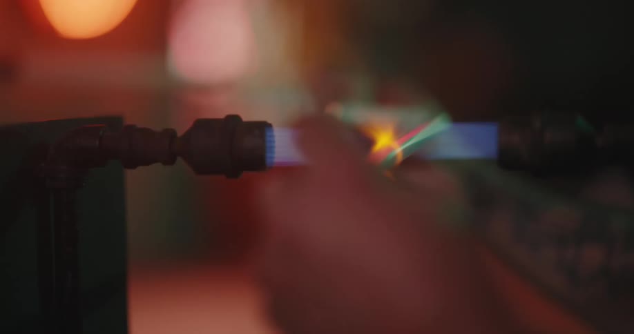 Concentrated man welding a pipe