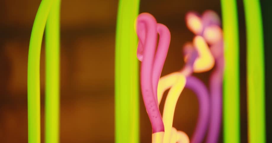 Neon sign with colorful lights in a dark room