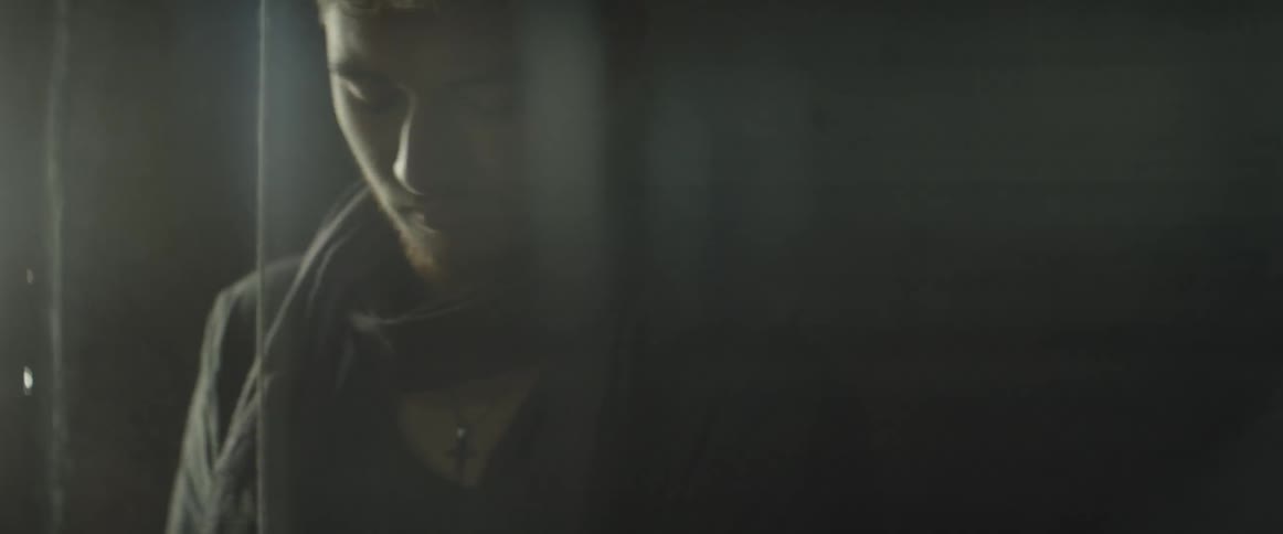A man working in a dark room