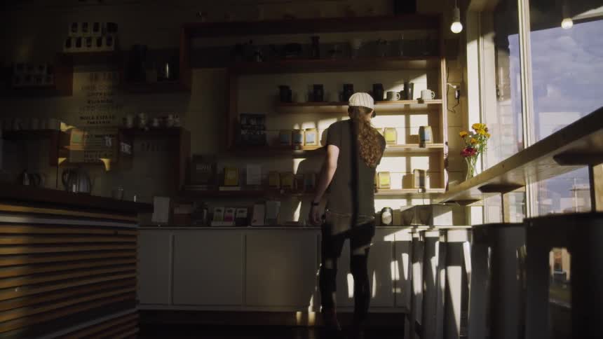 A customer looks at items on a shelf