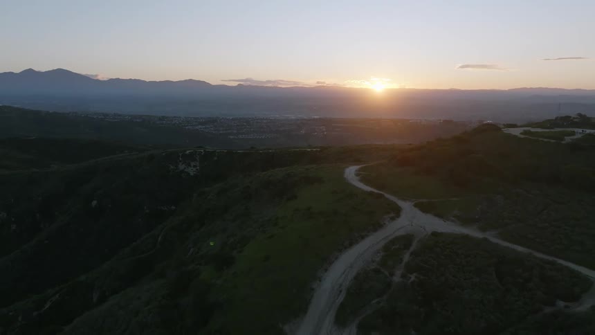 The sun is rising over the horizon