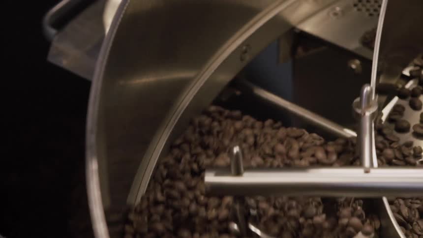 Coffee beans being mixed in mixing container