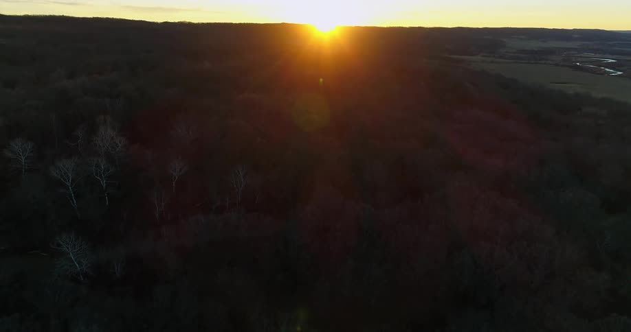 The sun is rising on the landscape
