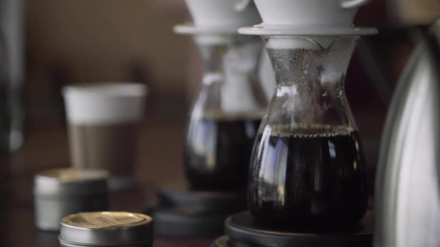 Coffee is dripping in a coffee pot