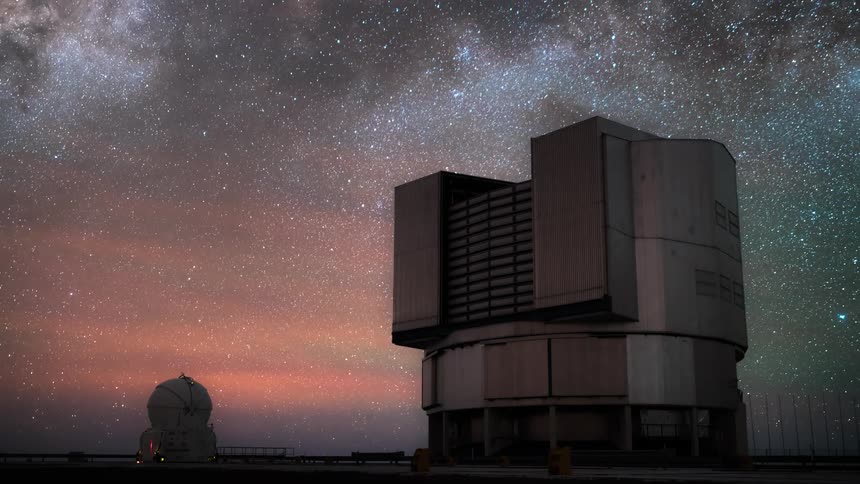 An observatory rotating sideways pointing towards the sky that would be all starry at night and time would pass quickly