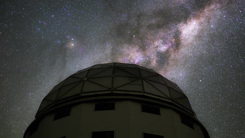 Astronomical observatory under a starry night sky