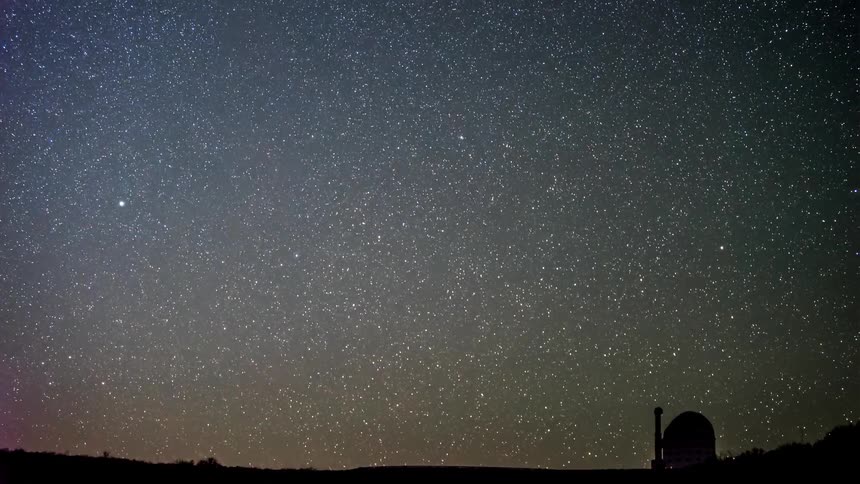 The stars move across the sky at night