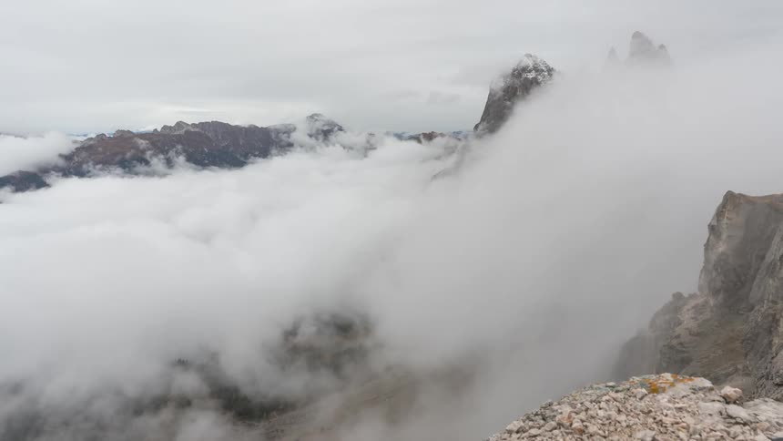 Dense clouds around a mountain peak