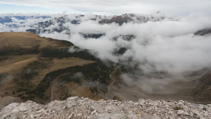 Mountainous landscape with low clouds covering the valleys