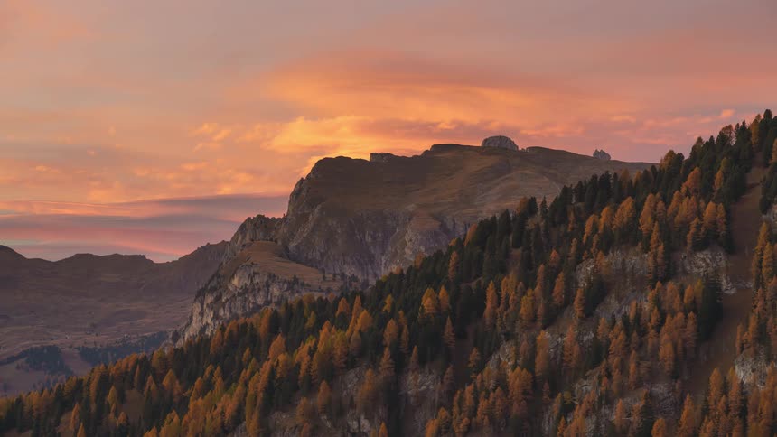 Mountainous landscape during dusk with trees