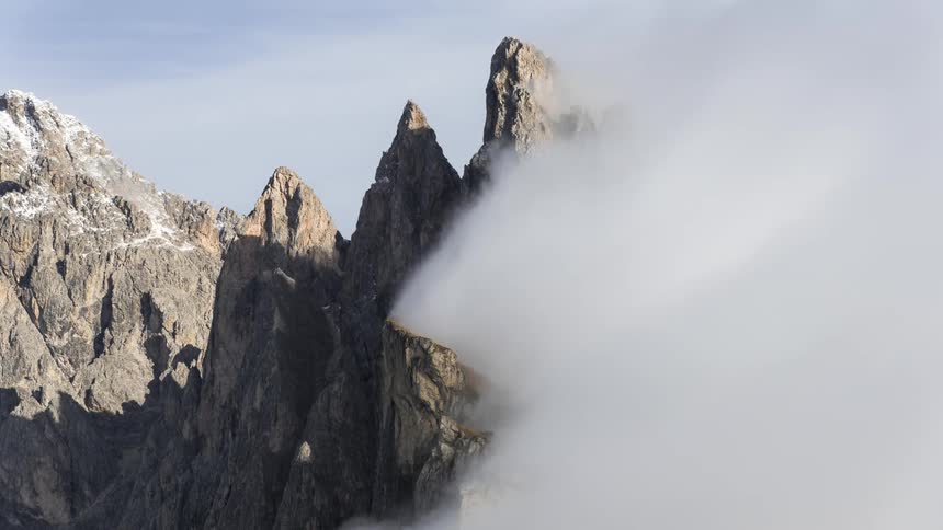 Clouds around a mountain peak