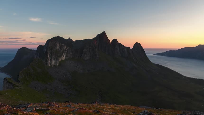 The mountains reach high above the clouds