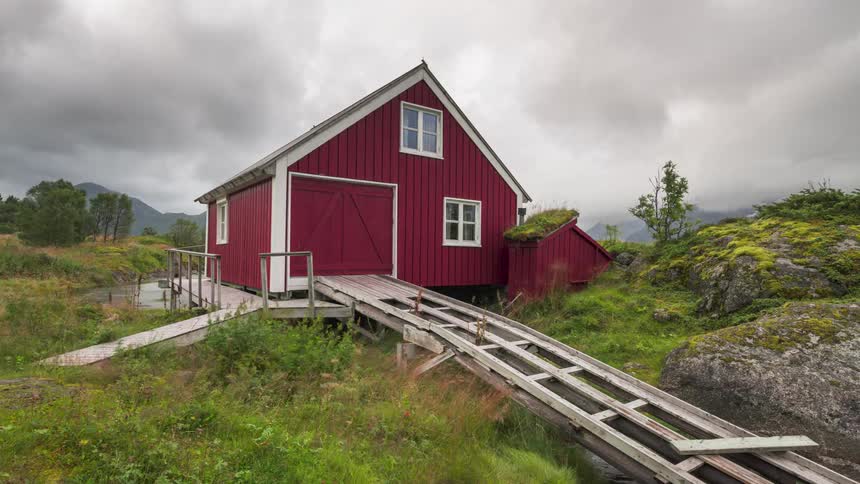 A barn is on the riverbed