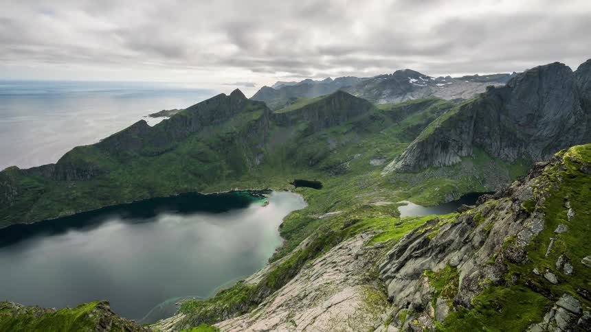 Aerial panorama of a seaside mountain valley on a cloudy day