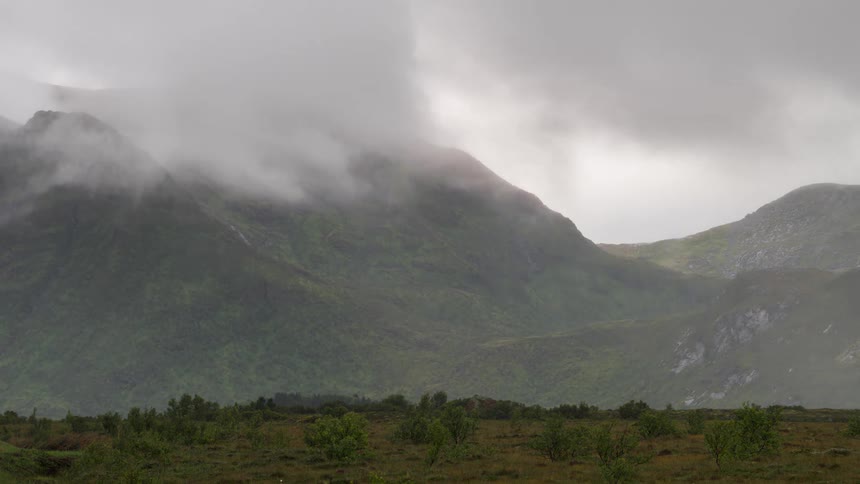 Mist passing over the green mountains