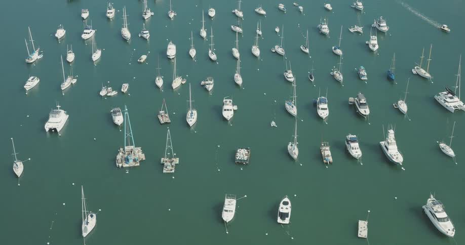 Aerial panorama of boats and yachts in the middle of the sea