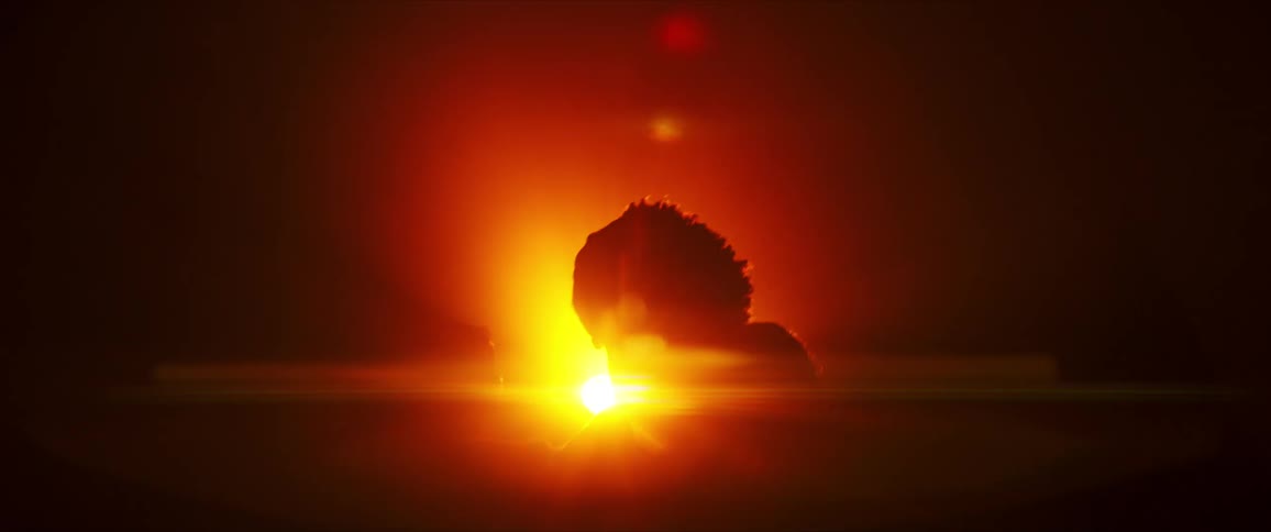 A male is dancing by himself during the night time