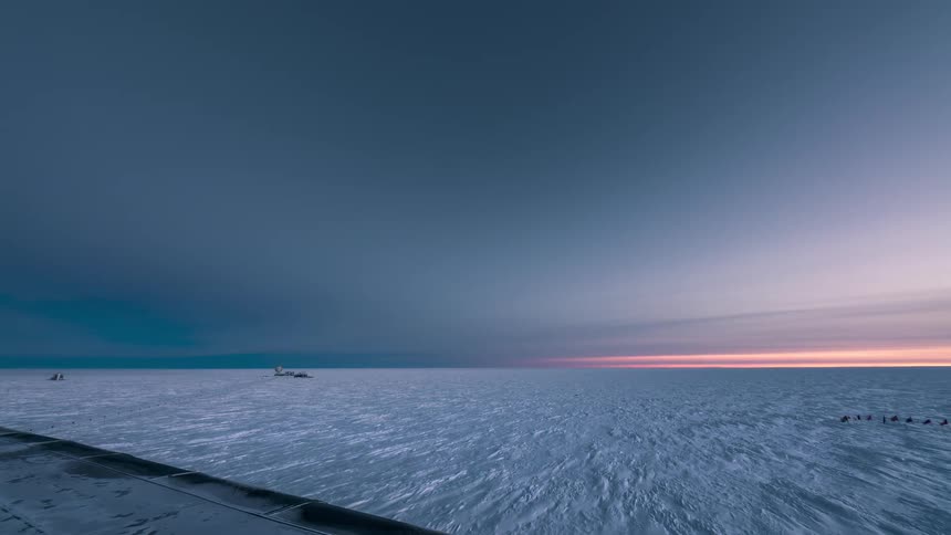 Time lapse of sunset over an arctic landscape