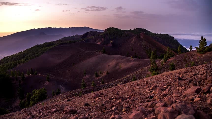 The sun sets on the mountain